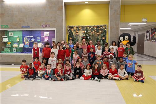 JiJi the Penguin with students from Lake Country Elementary